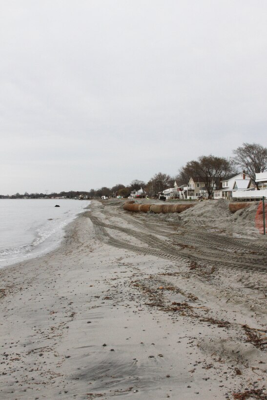 The U.S. Army Corps of Engineers and its contractor Great Lakes Dredge & Dock Company construct a berm system at Oakwood Beach, N.J in December of 2014. The project involves pumping approximately 350,000 cubic yards of sand from the Delaware onto the beach. Work is designed to reduce damages from future storm events and was funded through the Hurricane Sandy Relief Bill (PL 113-2).