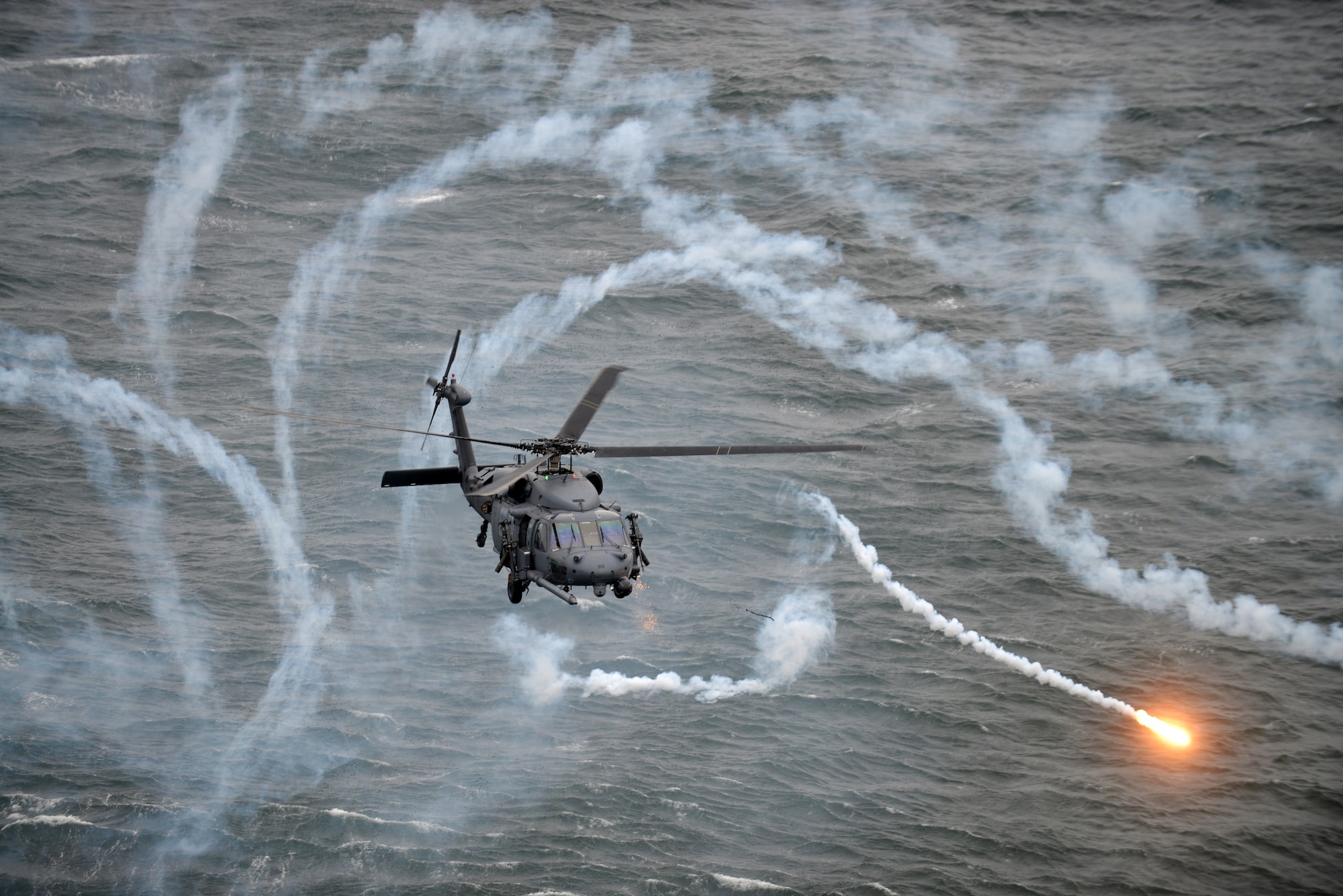 A HH-60 Pavehawk conducts training Nov. 25 2014, around Westhampton Beach, New York. During this time the aircrew tested the aircraft's defensive systems and conducted a simulated rescue of a downed Airman. The HH-60 is with the 101st Rescue Squadron. (U.S. Air National Guard photo/Senior Airman Christopher S. Muncy)