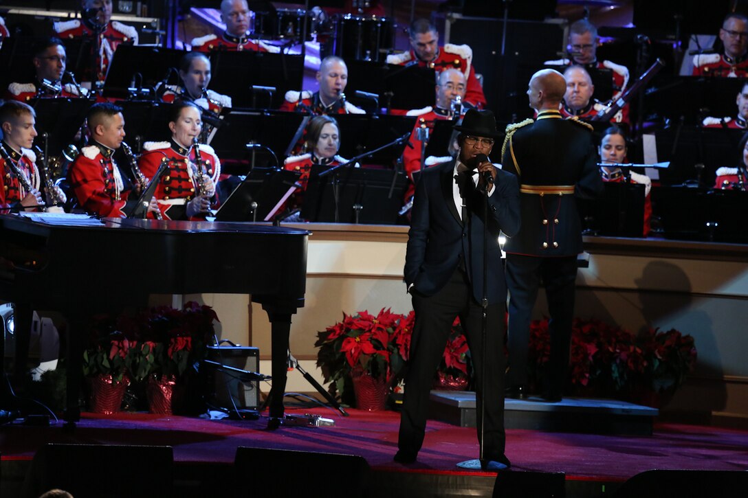 On Dec. 4, 2014 the Marine Band performed at the National Christmas Tree Lighting at President's Park in Washington, D.C. Pictured, Ne-Yo performing "I'll Be Home for Christmas." U.S. Marine Corps photo by Gunnery Sgt. Amanda Simmons/released)