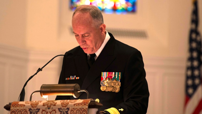 Rear Adm. Brent Scott, 19th Chaplain of the Marine Corps, speaks about Capt. Eli Takesian, the eighth Chaplain of the Marine Corps, during a final rites mass for Takesian at the Old Post Chapel at Fort Meyer, Va. on Dec. 4, 2014. Takesian died May 20, 2014 at the Walter Reed National Military Medical Center in Bethesda, Md. Takesian is most renowned for the care and aid he provided to the Marines of 1st Battalion, 5th Marine Regiment at the bloody battle of Hue City during the Vietnam War.