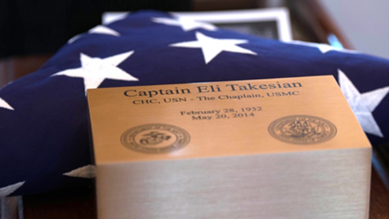 Capt. Eli Takesian’s ashes and service flag rest in the Old Post Chapel in Fort Meyer, Va. before being marched by the Navy Honor Guard to Takesian’s burial site on Dec. 4, 2014. Takesian died May 20, 2014 at the Walter Reed National Military Medical Center in Bethesda, Md. Takesian is most renowned for the care and aid he provided to the Marines of 1st Battalion, 5th Marine Regiment at the bloody battle of Hue City during the Vietnam War.