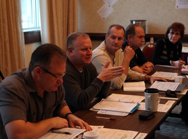 Huntsville Center Business Director Dan Heinzelman, Commander Col. Robert Ruch, Deputy Commander Lt. Col. Kendal Bergmann, Programs Director Charles Ford and Tracy Edmonds, a project manager with the  Center’s Army Central Metering program, participate in a strategic off site Dec. 3 at Lake Guntersville State Park Lodge in Guntersville, Alabama. The meeting allowed Center senior and emerging leaders to look over recent guidance from Headquarters U.S. Army Corps of Engineers and determine the direction of Huntsville Center within the paradigms set by the new USACE Campaign Plan.