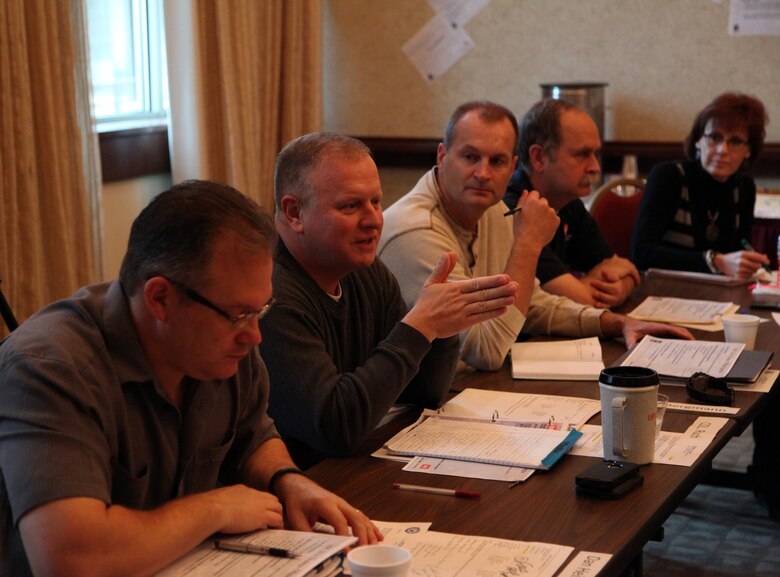 Huntsville Center Business Director Dan Heinzelman, Commander Col. Robert Ruch, Deputy Commander Lt. Col. Kendal Bergmann, Programs Director Charles Ford and Tracy Edmonds, a project manager with the  Center’s Army Central Metering program, participate in a strategic off site Dec. 3 at Lake Guntersville State Park Lodge in Guntersville, Alabama. The meeting allowed Center senior and emerging leaders to look over recent guidance from Headquarters U.S. Army Corps of Engineers and determine the direction of Huntsville Center within the paradigms set by the new USACE Campaign Plan.