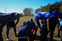 Sergeant Maj. Alex Dobson, the regimental sergeant major of Combat Logistics Regiment 25, 2nd Marine Logistics Group, plans for the next play with his team during the CLR-25 Turkey Bowl aboard Marine Corps Base Camp Lejeune, N.C., Nov. 21, 2014. Marine with the unit participated in the Turkey Bowl with family and friends for friendly competition and unit cohesion.