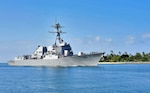 In this photo, the guided-missile destroyer USS Michael Murphy (DDG 112) is returning with 19 civilians embarked who were transferred from Protecteur, which experienced an engine fire and is under tow returning to Pearl Harbor.      