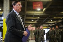 Mr. Paul Peters, acting Assistant Secretary of Defense for Logistics and Materiel Readiness, addresses the Marines of 2nd Supply Battalion, Combat Logistics Regiment 25, 2nd Marine Logistics Group, during a ceremony aboard Camp Lejeune, N.C., Dec. 3, 2014. He commended the Marines for their efforts, and recognized their individual jobs as an asset to the Marine Corps.