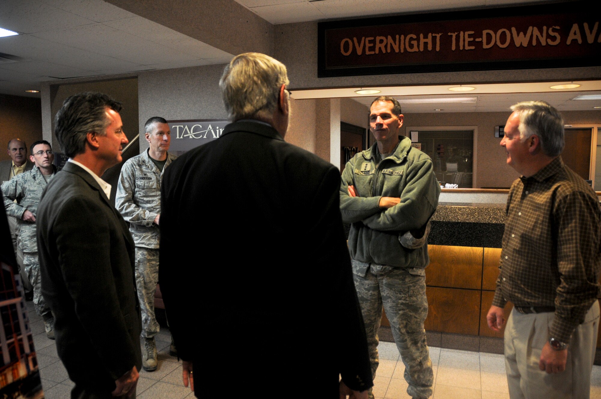Lt. Gen. Stanley E. Clarke III, director of the Air National Guard, meets with city officials Dec. 5, 2014, at TACAir in Fort Smith, Ark.  to thank them for their support of the 188th Wing. Clarke toured the 188th Wing’s facilities, spoke with Airmen, and learned about the unit’s mission and contributions to the Air National Guard on his day-long visit. (U.S. Air National Guard photo by Airman 1st Class Cody Martin/released)