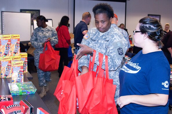 The Airman and Family Readiness Center held a toy collection hosted by Operation Homefront, a non-profit organization that provides assistance for U.S. troops and their families around the world, Sheppard Air Force Base, Texas. Toys were donated by the community around the base and collected from local stores as part of a nation-wide program to more than 80 military families here. (U.S. Air Force photo by Danny Webb/Released) 
