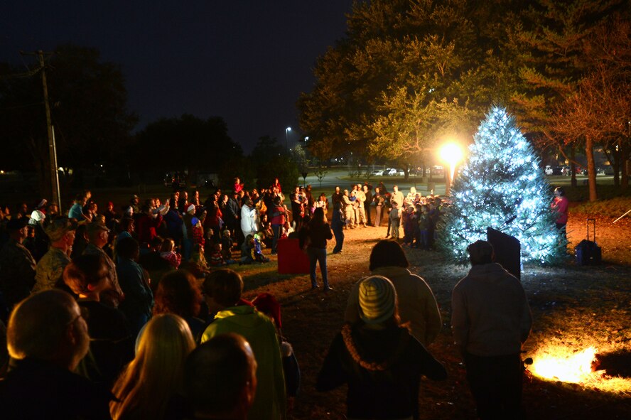 Team Shaw members and their families observe a Religious Display Interfaith Ceremony at the Friendship Chapel at Shaw Air Force Base, S.C., Dec. 4, 2014. During the event, two holiday songs were sung by the Shaw Heights Elementary School choir to approximately 200 observers. (U.S. Air Force photo by Airman 1st Class Jensen Stidham/Released)