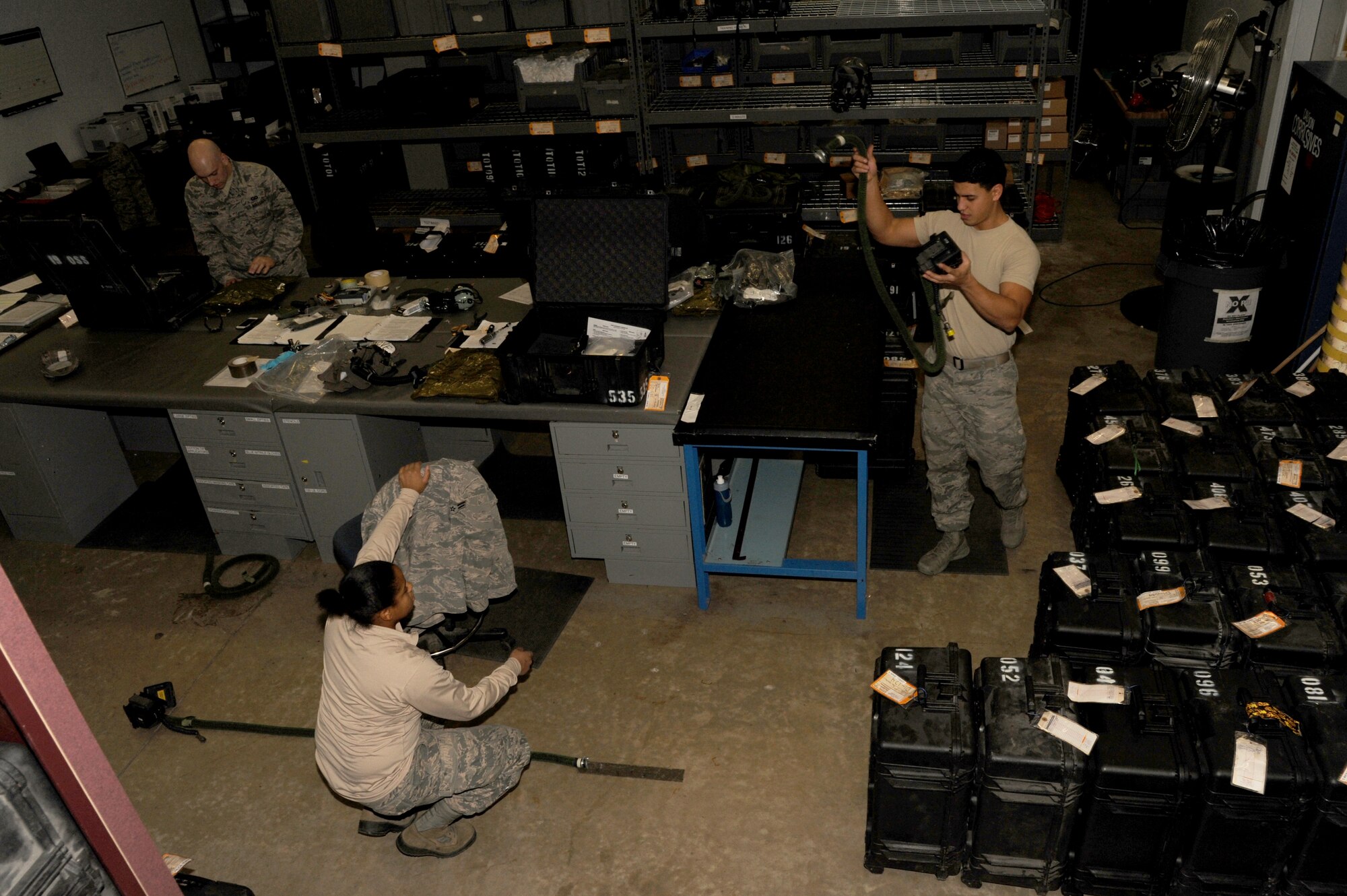 Airmen work in aircrew chemical defense Nov. 24, 2014, at Little Rock Air Force Base, Ark. In the chemical defense section of aircrew flight equipment, Airmen are responsible for supplying an aircrew’s equipment that protects against chemical warfare. (U.S. Air Force photo by Airman 1st Class Mercedes Muro)
