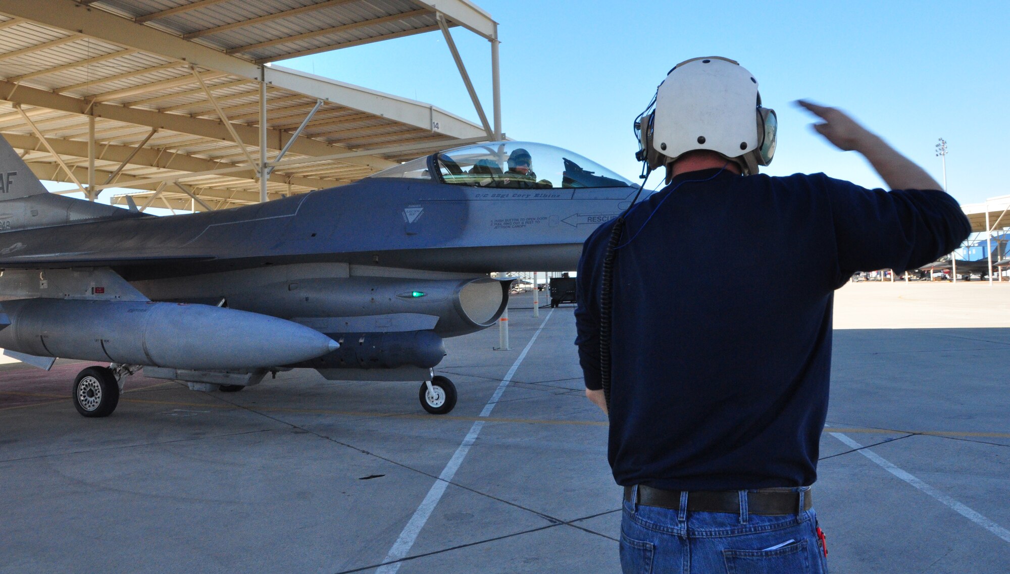 Col. Bruce Cox, 10th Air Force A3/A7 director of Operations and Plans, taxis out for his 'fini' flight in the Fighting Falcon at Naval Air Station Fort Worth Joint Reserve Base, Texas. Col. Cox is leaving to become the 307th Bomb Wing commander at Barksdale Air Force Base, La. (U.S. Air Force photo/Master Sgt. Julie Briden-Garcia)