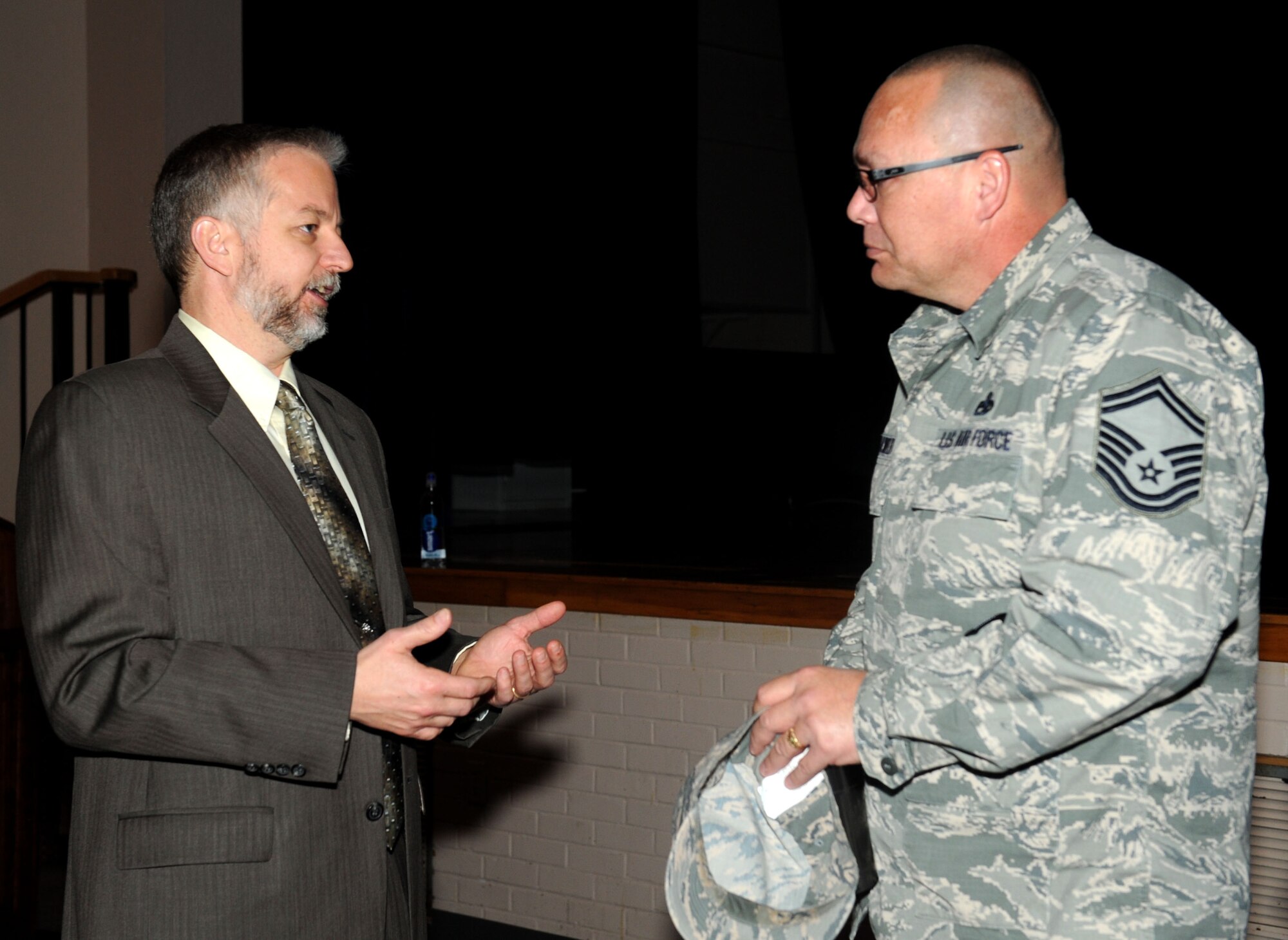 Danny Wright (left), Boeing KC-46A chief mechanic, answers an Airman’s question about the KC-46A Pegasus, Dec. 4, 2014, at McConnell Air Force Base, Kan. Wright briefed McConnell Airmen about the current status of the new tanker, which is amongst the Air Force’s top three acquisition priorities. (U.S. Air Force photo/Airman 1st Class Tara Fadenrecht)