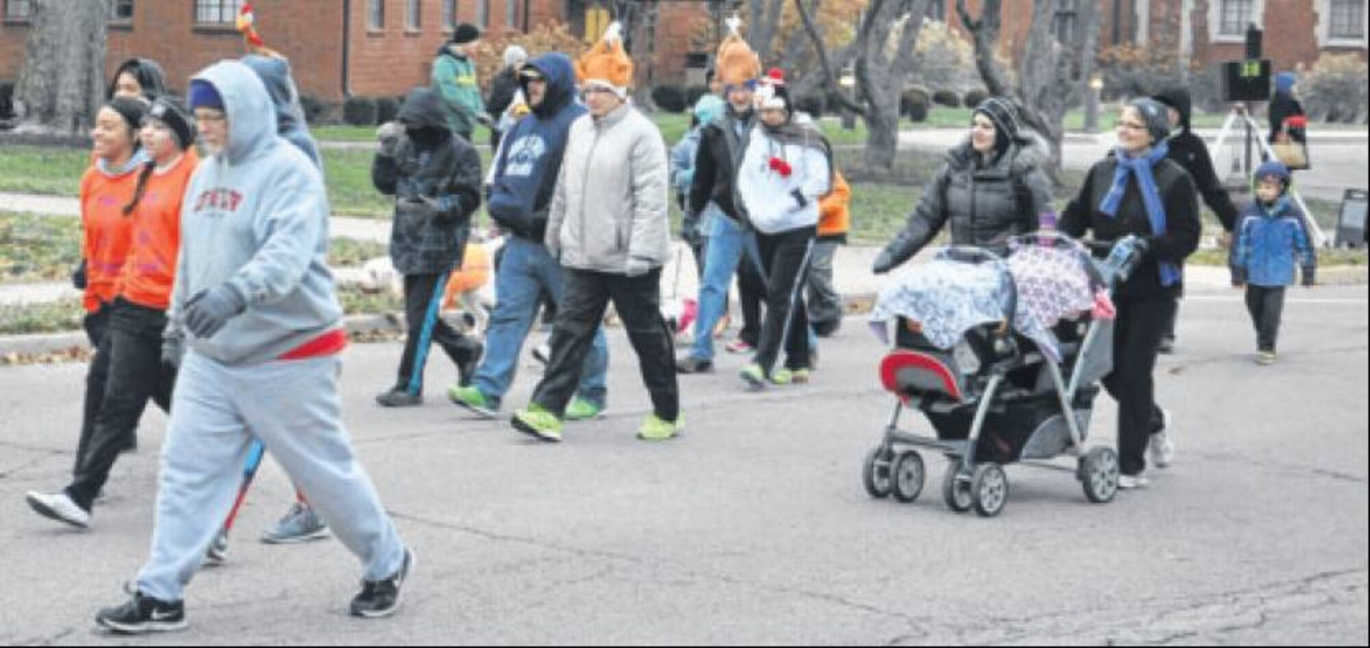 Approximately 200 participants gathered near Dodge Gym for the eighth annual Wright-Patterson Air Force Base Turkey Trot on Nov. 27. Runners, walkers, strollers and participanys of all fitness levels can participate in base fun runs. (Air Force photo by Diane Kofoed)