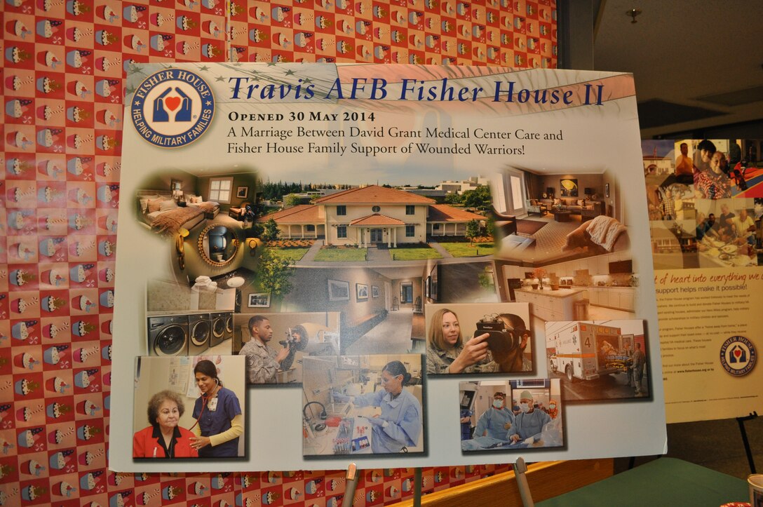 TRAVIS AIR FORCE BASE, Calif. --  The 13th annual Travis Air Force Base Holiday Tree Festival and Silent Auction has held on Nov. 21, Travis AFB, Calif.. Team Travis membes comes together with local community partners each year to decorate and then donate trees, baskets of gifts and more, to benefit the Travis Fisher House I and now, the new Fisher House II. At the end of the evening, between the generosity of those inside, and outside the gates of Travis, $30,000 was raised for the Fisher Houses. (U.S. Air Force photo/Ellen Hatfield)
