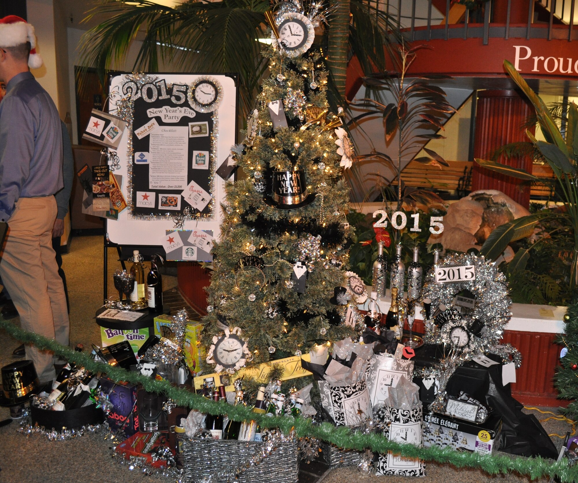 TRAVIS AIR FORCE BASE, Calif. --  The 13th annual Travis Air Force Base Holiday Tree Festival and Silent Auction has held on Nov. 21, Travis AFB, Calif.. Team Travis membes comes together with local community partners each year to decorate and then donate trees, baskets of gifts and more, to benefit the Travis Fisher House I and now, the new Fisher House II. At the end of the evening, between the generosity of those inside, and outside the gates of Travis, $30,000 was raised for the Fisher Houses. (U.S. Air Force photo/Ellen Hatfield)
