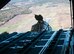 Cargo flies out the back of a U.S. Air Force C-130 Hercules over North Georgia Nov. 20, 2014. In an aerial delivery role, the Hercules can airdrop loads up to 42,000 pounds or use its high-flotation landing gear to land and deliver cargo on rough, dirt strips. (U.S. Air Force photo by Senior Airman Daniel Phelps/Released)