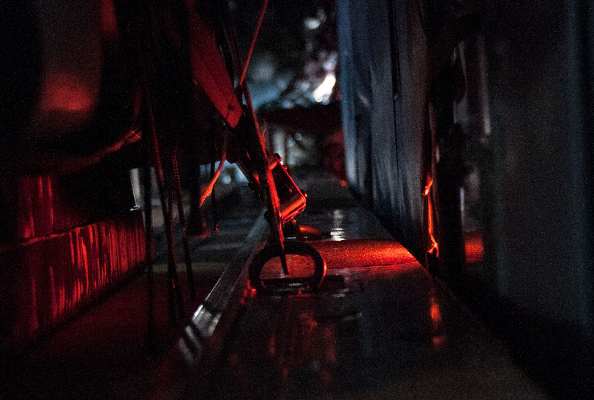 The wireless gate cutter’s blade is attached to cargo in a U.S. Air Force C-130 Hercules Nov. 20, 2014. In an aerial delivery role, the Hercules can airdrop loads up to 42,000 pounds or use its high-flotation landing gear to land and deliver cargo on rough, dirt strips. (U.S. Air Force photo by Senior Airman Daniel Phelps/Released)