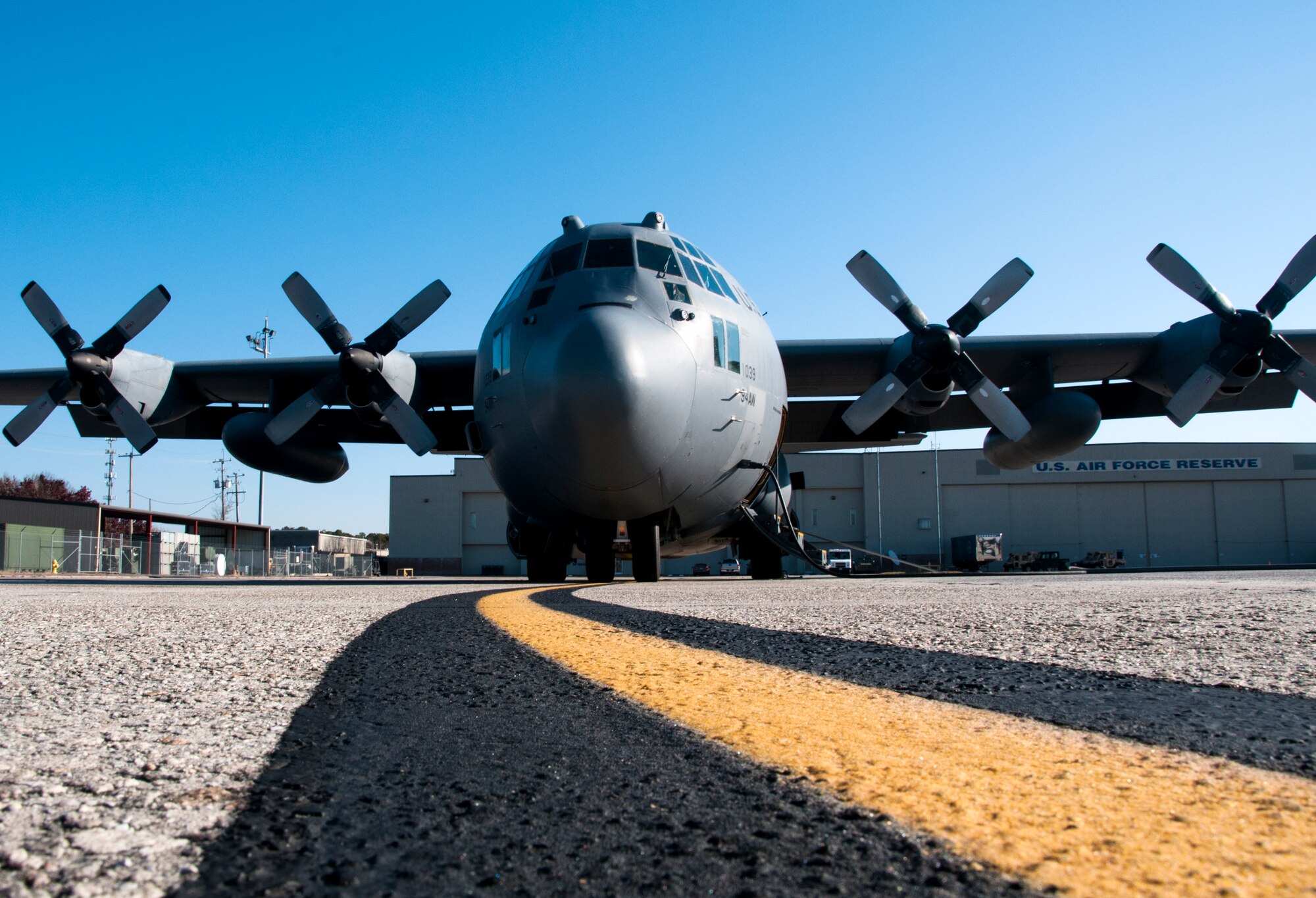 A U.S. Air Force C-130 Hercules sits on the flightline at Dobbins Air Reserve Base, Ga. Nov. 20, 2014. Dobbins is home of the 94th Airlift Wing. (U.S. Air Force photo by Senior Airman Daniel Phelps/Released)