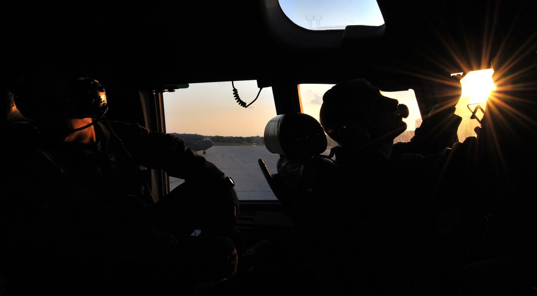 WRIGHT-PATTERSON AIR FORCE BASE, Ohio - Pilots from the 89th Airlift Wing, Wright Patterson Air Force Base, Ohio, prepare for take-off as the sun sets Sept. 5, 2014. The aircrew was leaving for a short trip to Toledo, Ohio, to train with the Ohio Air National Guard for the unit training assembly weekend. (U.S. Air Force photo/Tech. Sgt. Frank Oliver)
