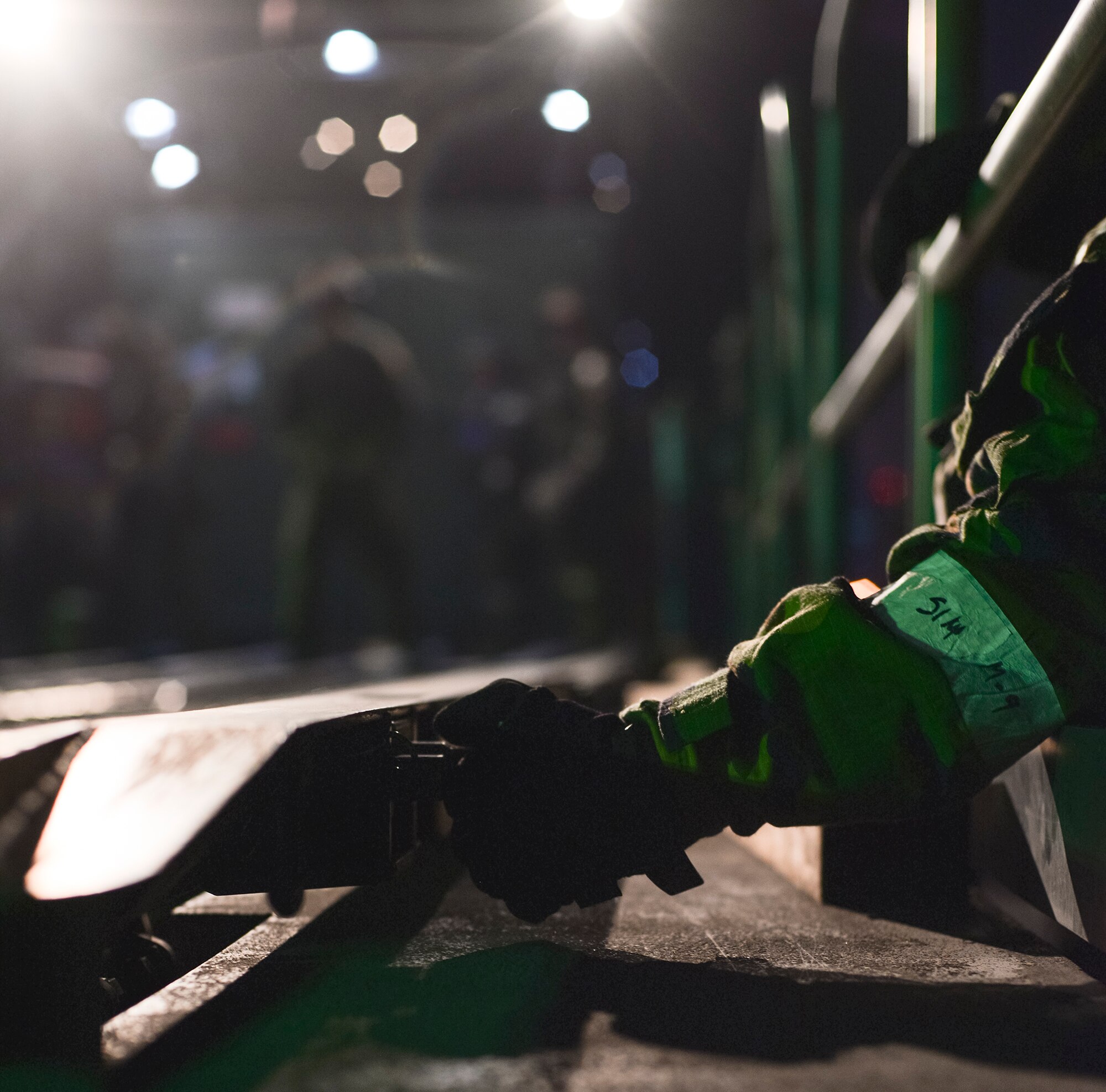 Airmen prepare to unload cargo off a C-130 during operational readiness exercise Beverly Bulldog 15-1 Dec. 4, 2014, at Osan Air Base, Republic of Korea. Beverly Bulldog 15-1 is a peninsula-wide ORE designed to test American forces mission readiness in the event of an emergency or wartime environment. (U.S. Air Force photo by Staff Sgt. Jake Barreiro)








