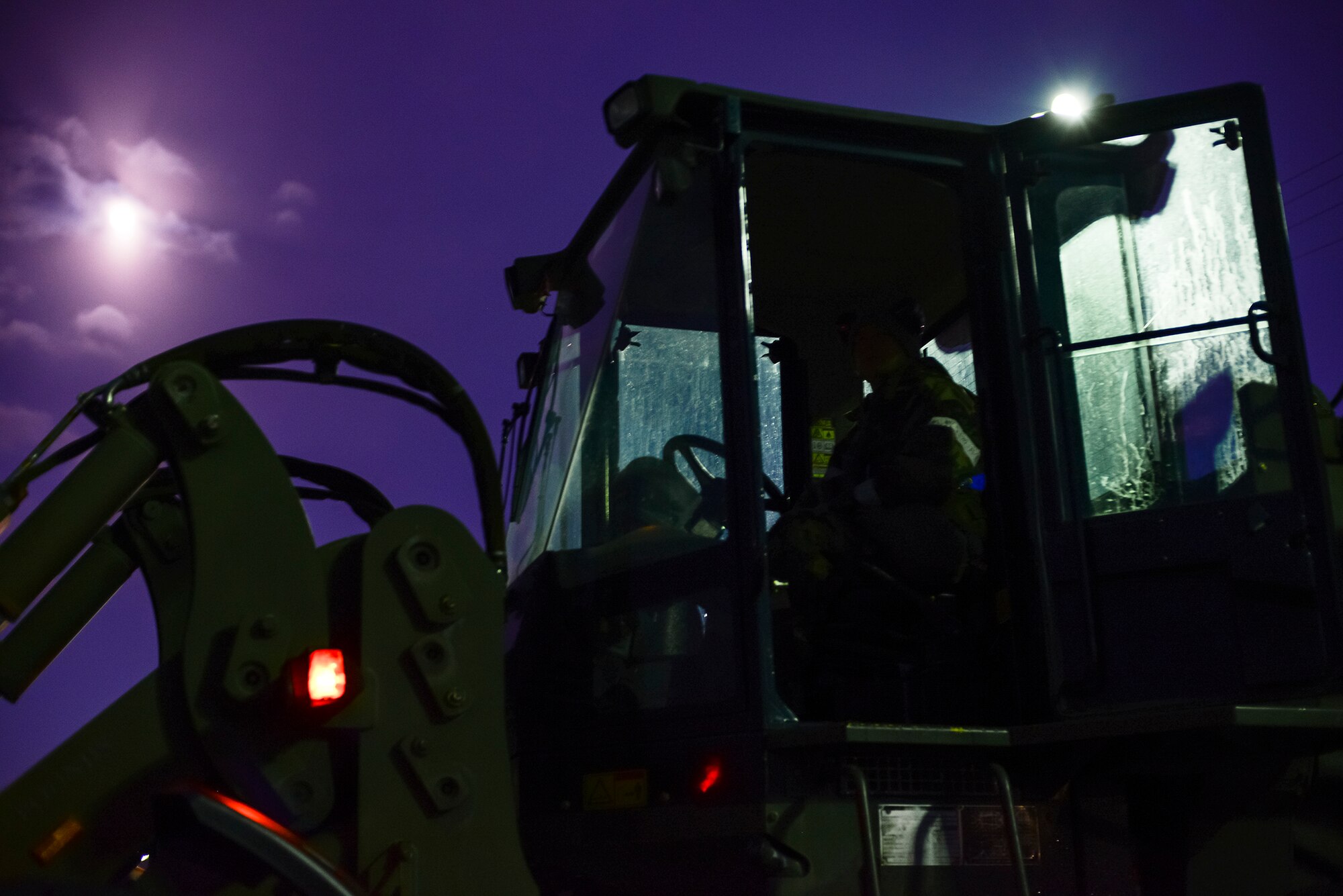 An operator from the 731st Air Mobility Squadron prepares to load cargo during operational readiness exercise Beverly Bulldog 15-1 Dec. 4, 2014, at Osan Air Base, Republic of Korea. Beverly Bulldog 15-1 is a peninsula-wide ORE designed to test American forces readiness in the event of an emergency or wartime environment. (U.S. Air Force photo by Staff Sgt. Jake Barreiro)




