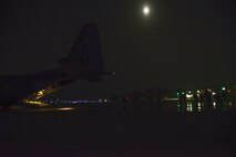 Personnel depart a C-130 while arriving at Osan Air Base, Republic of Korea, during operational readiness exercise Beverly Bulldog 15-1 Dec. 4, 2014. Beverly Bulldog 15-1 is a peninsula-wide ORE designed to test American mission readiness in the event of an emergency or wartime environment. (U.S. Air Force photo by Staff Sgt. Jake Barreiro)


