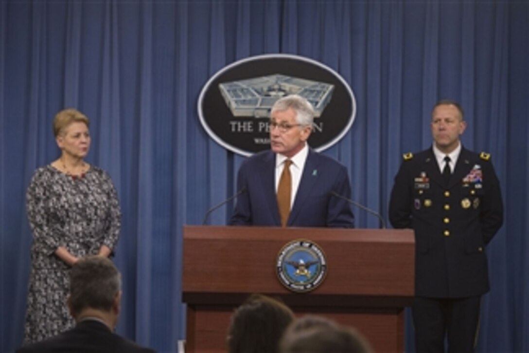 Defense Secretary Chuck Hagel announces the release of a report noting progress in eliminating sexual assault within the military during the past three fiscal years while briefing reporters at the Pentagon, Dec. 4, 2014. Hagel was joined by Army Maj. Gen. Jeffrey J. Snow, director, DoD Sexual Assault Prevention and Response Office, right, and Jessica Wright, undersecretary of defense for personnel and readiness. 
