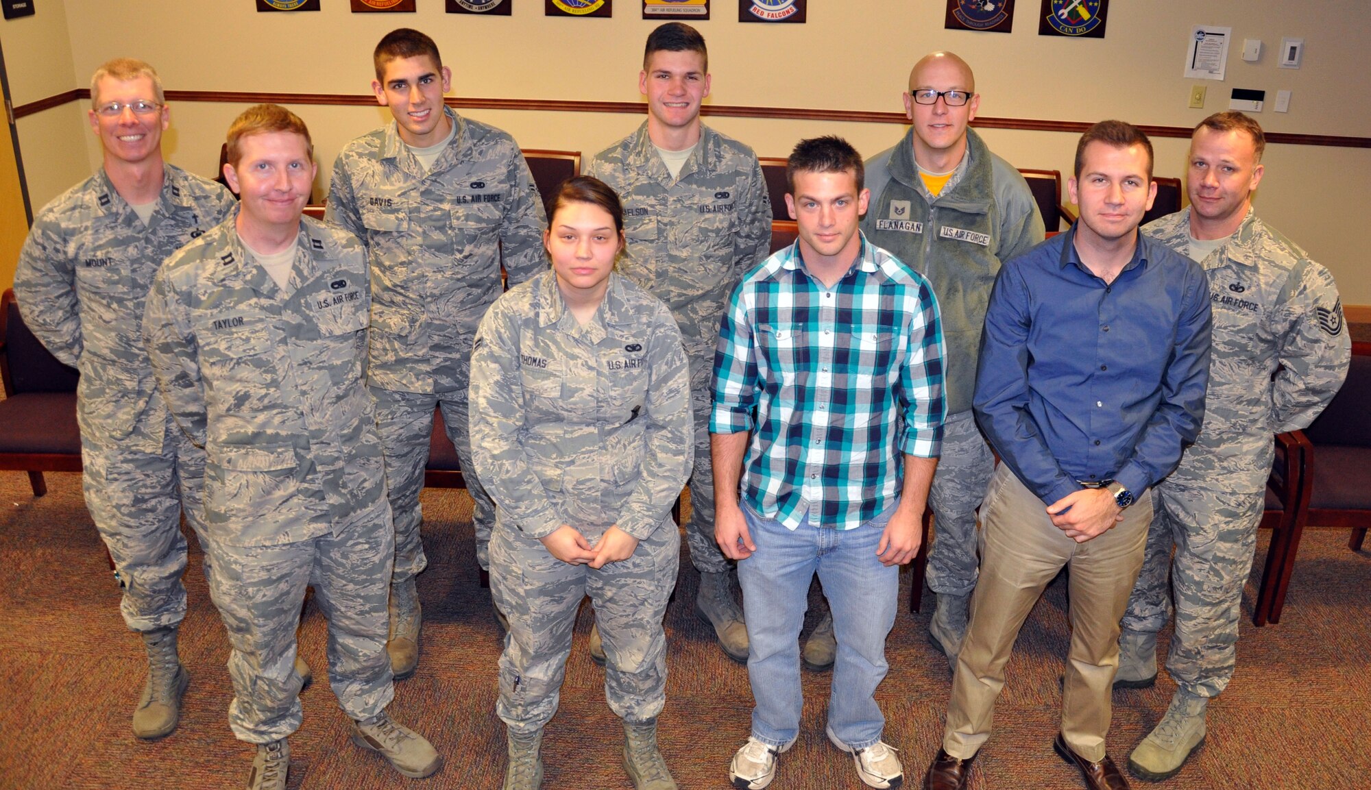 The Air Force Reserve 931st Air Refueling Group, McConnell Air Force Base, Kan., welcomed nine new members to the unit during the December Unit Training Assembly, Dec. 6, 2014.  (U.S. Air Force photo by Capt. Zach Anderson)