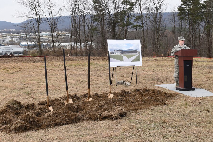 First Lt. Colin Wilson speaks as the emcee at the Combined Communications Facility Groundbreaking on Dec. 4, 2014 at Fort Indiantown Gap, Pa. “Today, you see before you the leveled ground upon which the Combined Communications Facility will be built, said Wilson. “This will be truly remarkable, as it will facilitate the aggregation of some of the most talented cyber and communications Airmen within the Commonwealth.” (U.S. Air National Guard photo by Amn Julia Sorber/Released)