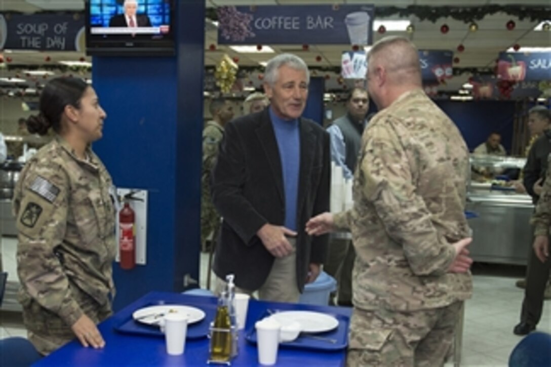 U.S. Defense Secretary Chuck Hagel visits U.S. service members at the International Security Assistance Force dining facility in Kabul, Afghanistan, Dec. 6, 2014. 