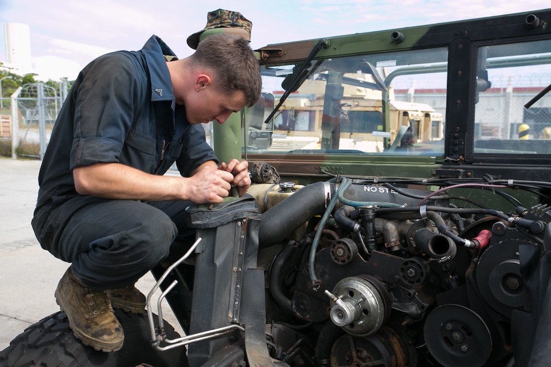 Cpl. Matthew Huberlach, an automotive maintenance technician with maintenance platoon, Combat Logistics Battalion 31, replaces the water pump on a M1123 Humvee at the CLB’s maintenance building, Nov. 26. The Marines of CLB-31 support the 31st Marine Expeditionary Unit with ordnance, communications, engineering and motor transport maintenance to ensure the unit is ready for any mission. The Marines and sailors of CLB-31 are permanently assigned to the 31st MEU as the logistics combat element and are conducting pre-deployment preparations for the regularly-scheduled Spring Patrol of the Asia-Pacific region. 