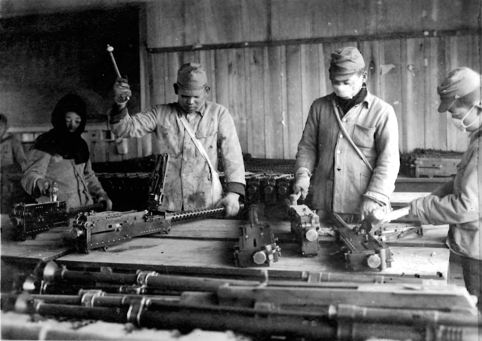 This photo taken in late 1945,  shows Japanese laborers working in the Yokota Air Base ordnance shop. (U.S. Air Force photo courtesy of the 374 Airlift Wing History Office)
