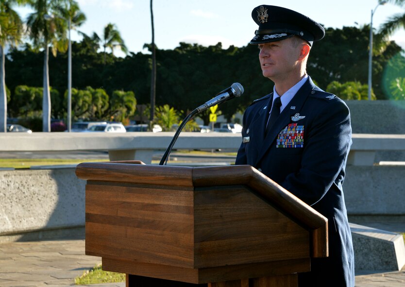 U.S. Air Force Col. Randy Huiss, 15th Wing commander, speaks to attendees of the Attack on Hickam Field Remembrance Ceremony at Joint Base Pearl Harbor-Hickam, Hawaii, Dec. 7, 2014. This year’s ceremony marks 73 years to the day since the attack occurred in 1941. More than 50 survivors and family members of survivors attended the ceremony, which honors the 189 Airmen who lost their lives in the attack. (U.S. Air Force photo by Staff Sgt. Alexander Martinez/Released) 