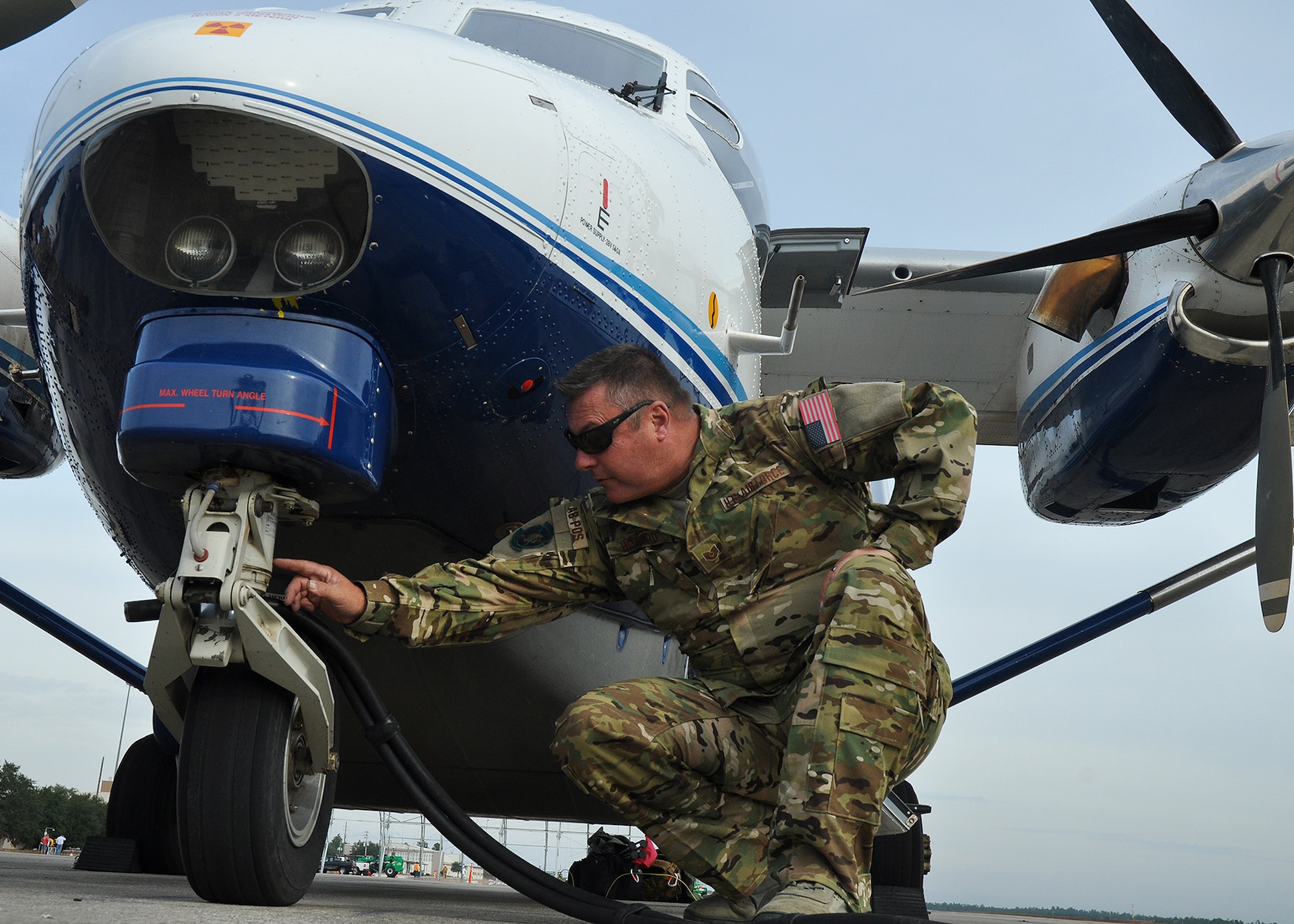 Tech. Sgt. Michael Howard, 919th Operations Support Squadron, checks out the C-145 prior to his incentive flight Nov. 30.  Howard was the first to receive a flight under the new incentive flight program that began in October.  (U.S. Air Force photo/Dan Neely)