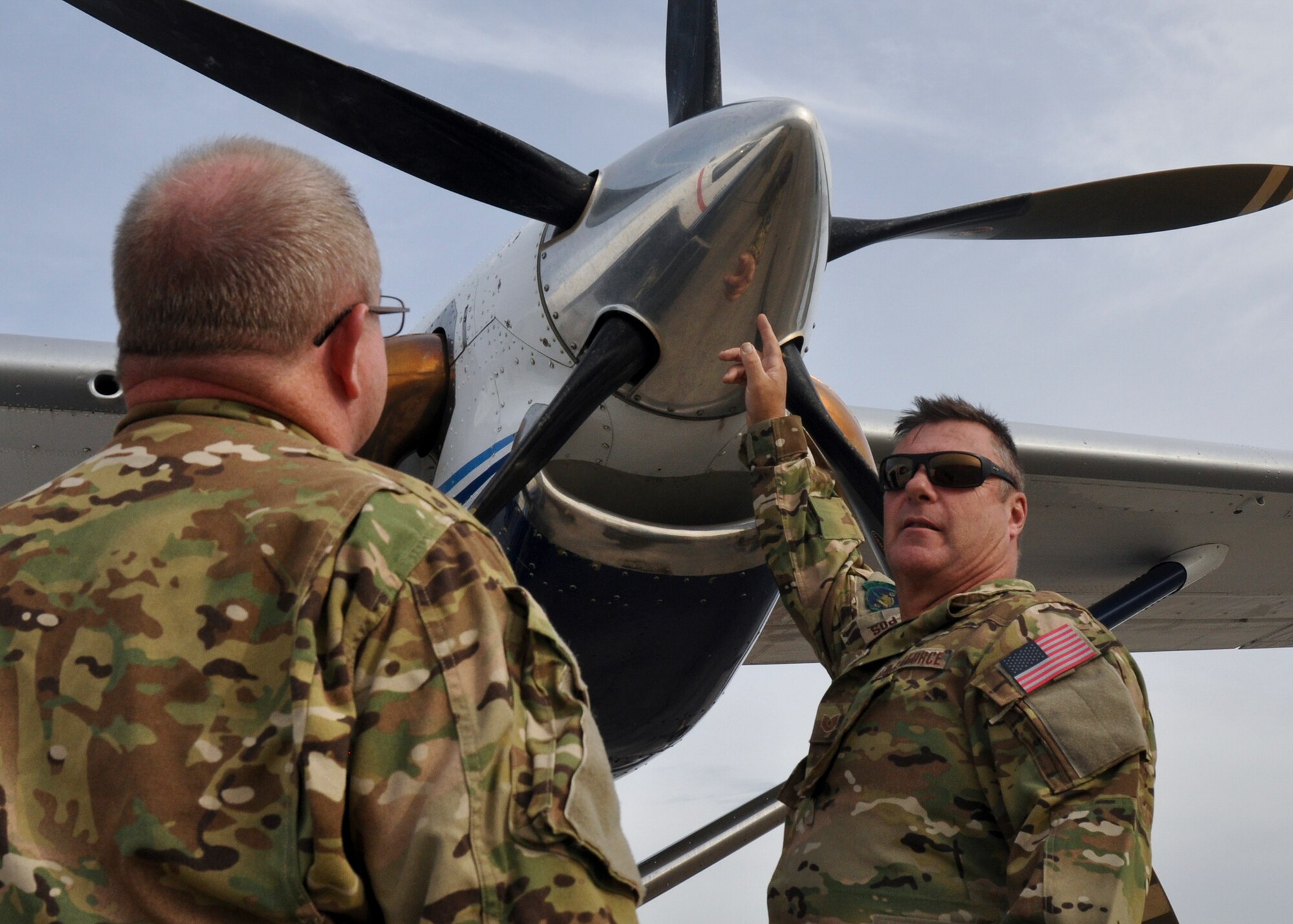 Tech. Sgt. Michael Howard, 919th Operations Support Squadron, checks out the C-145 prior to his incentive flight Nov. 30.  Howard was the first to receive a flight under the new incentive flight program that began in October.  (U.S. Air Force photo/Dan Neely)