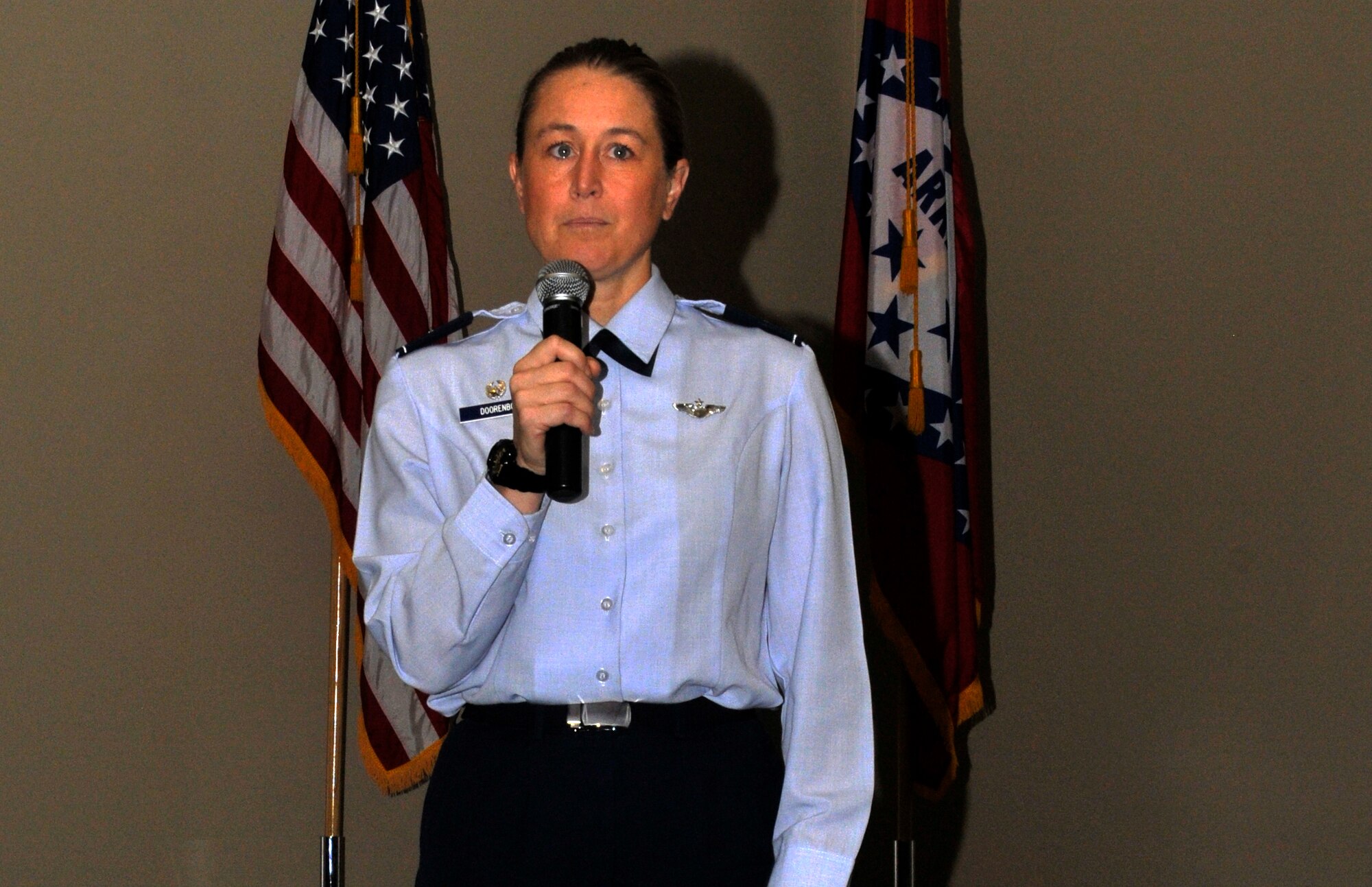 Col. Bobbi Doorenbos addresses Airmen at the 188th Wing Dec. 7, 2014. Doorenbos is currently assigned to the Arizona Air National Guard where she serves as the 214th Reconnaissance Group commander. Doorenbos is scheduled to take command of the 188th in January 2015. (U.S. Air National Guard photo by Staff Sgt. John Suleski/released)
