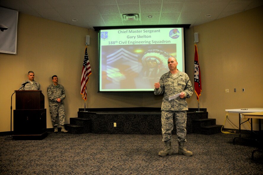 Chief Master Sgt. Gary Skelton, chief of operations for the RED HORSE training center, speaks to the audience at his promotion ceremony to the rank of chief master sergeant, Dec. 7, 2014 at Ebbing Air National Guard Base, Fort Smith, Ark. Skelton has served 35 years in the Air National Guard and the 188th Wing. (U.S. Air National Guard photo by Airman 1st Class Cody Martin/Released)