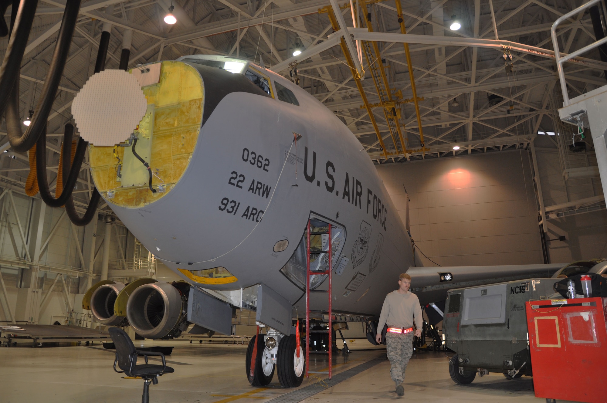 Airmen from the 931st Maintenance Squadron performed a periodic inspection of a KC-135 Stratotanker during the December Unit Training Assembly, McConnell Air Force Base, Kan., Dec. 7, 2014.  As part of the inspection, the plane was jacked 4 inches above the surface of Hangar 10. (U.S. Air Force photos by Tech. Sgt. Abigail Klein)