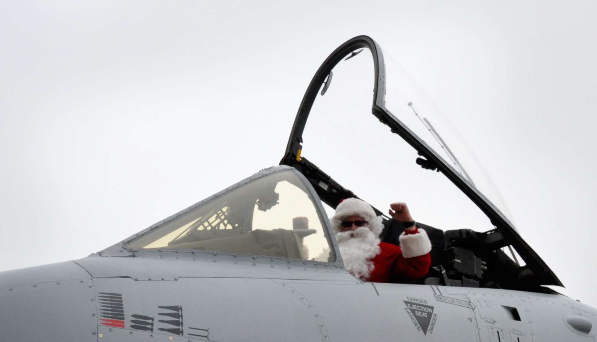 Lt. Col. Santa Clause prepares to egress his “supersonic” A-10 outside the 442d Fighter Wing’s aircraft hangar which housed the Christmas party December 6, 2014 at Whiteman AFB, Mo. (Photo by Missouri Civil Air Patrol)