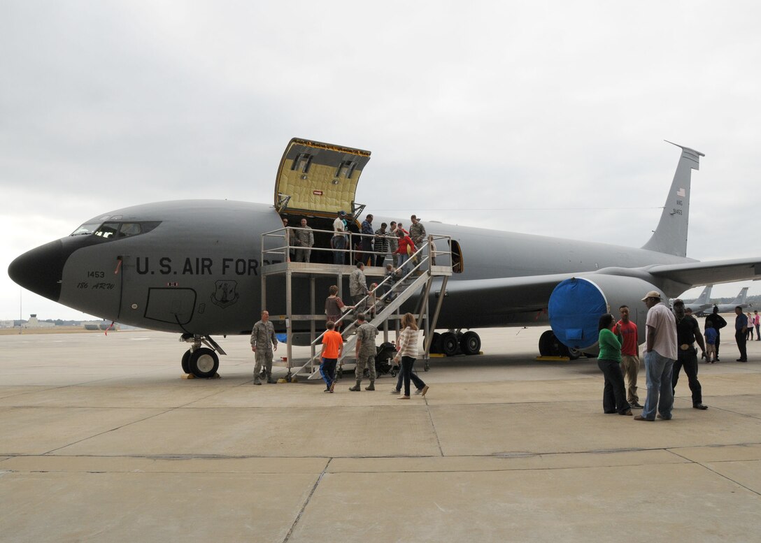 Family members of the 186th Air Refueling Wing tour a KC-135 Stratotanker during the annual Family Day celebration on Key Field Air National Guard Base, Meridian, Miss., Dec. 6, 2014.  Touring the plane was one of the many activities available to the members’ families during the event.  (U.S. Air National Guard photo by Senior Airman Jessica Fielder/Released).