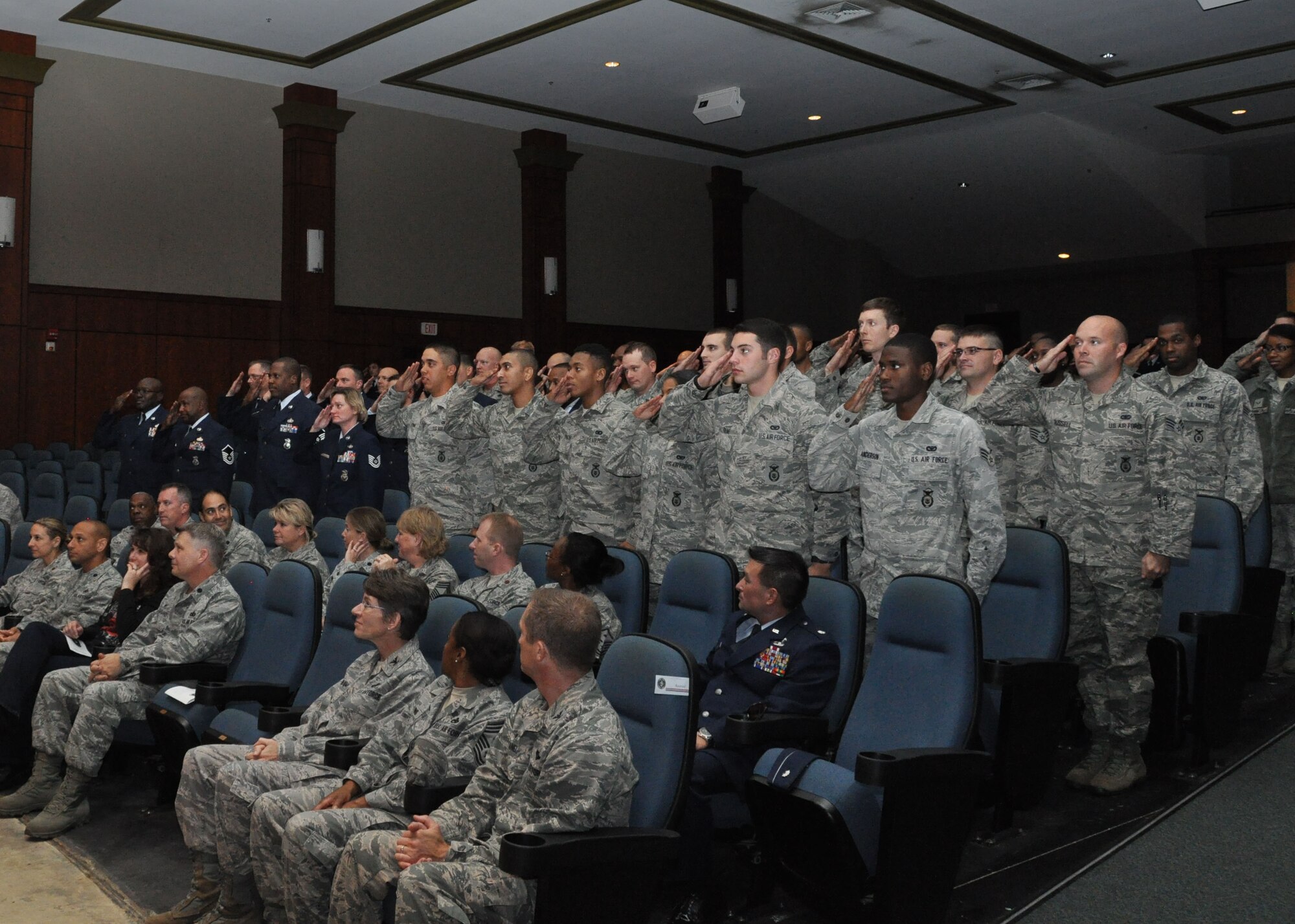 Airmen assigned to the 315th Security Forces Squadron, Joint Base Charleston, South Carolina, honor outgoing commander, Maj. Shawn M. Swarz during the squadron's change of command ceremony held at the base theater Dec. 6, 2014. (U.S. Air Force photo by Staff Sgt. Bobby Pilch)