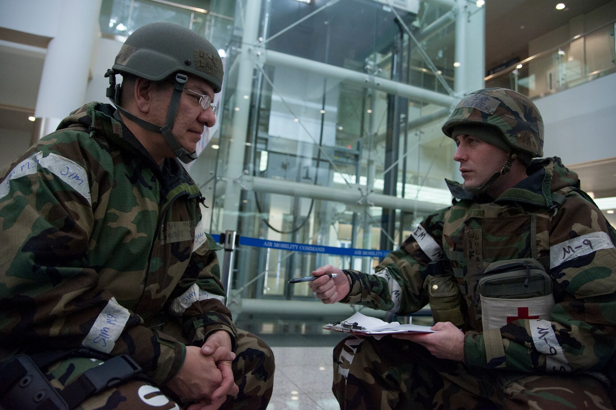 Tech. Sgt. Lucas Boyer, 51st Medical Operations Squadron NCO in charge of mental health and member of the disaster mental health team, simulates a one-on-one consultation with an Airman during operational readiness exercise Beverly Bulldog 15-1 Dec. 7, 2014, at Osan Air Base, Republic of Korea. The DMHR team’s goal is to prevent acute stress disorder or posttraumatic stress disorder during a wartime environment by providing assistance Airmen in need. (U.S. Air Force photo by Senior Airman Matthew Lancaster)