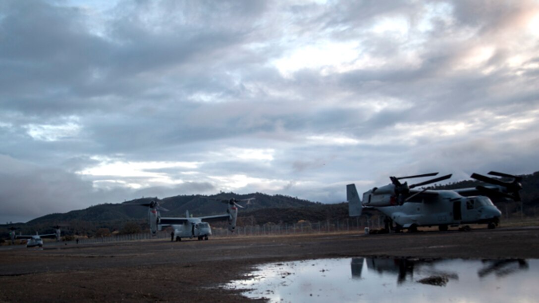 MV-22B Ospreys with Marine Medium Tilt-Rotor Squadron 161 land during Realistic Urban Training aboard Fort Hunter Liggett, Calif., Dec. 4, 2014. RUT prepares the 15th MEU Marines for their upcoming deployment, enhancing their combat skills in environments similar to those they may find in future missions. (U.S. Marine Corps photo by Cpl. Elize McKelvey/Released)