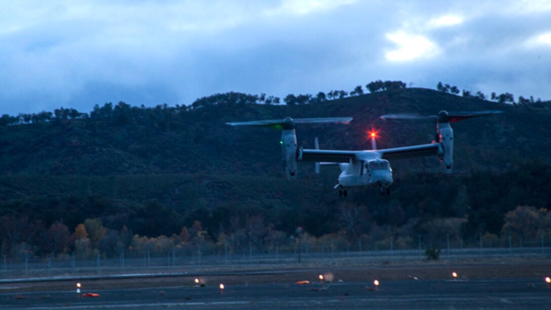 An MV-22B Osprey with Marine Medium Tilt-Rotor Squadron 161 (Reinforced) prepares to land during Realistic Urban Training aboard Fort Hunter Liggett, Calif., Dec. 4, 2014. RUT prepares the 15th MEU Marines for their upcoming deployment, enhancing their combat skills in environments similar to those they may find in future missions. (U.S. Marine Corps photo by Cpl. Elize McKelvey/Released)