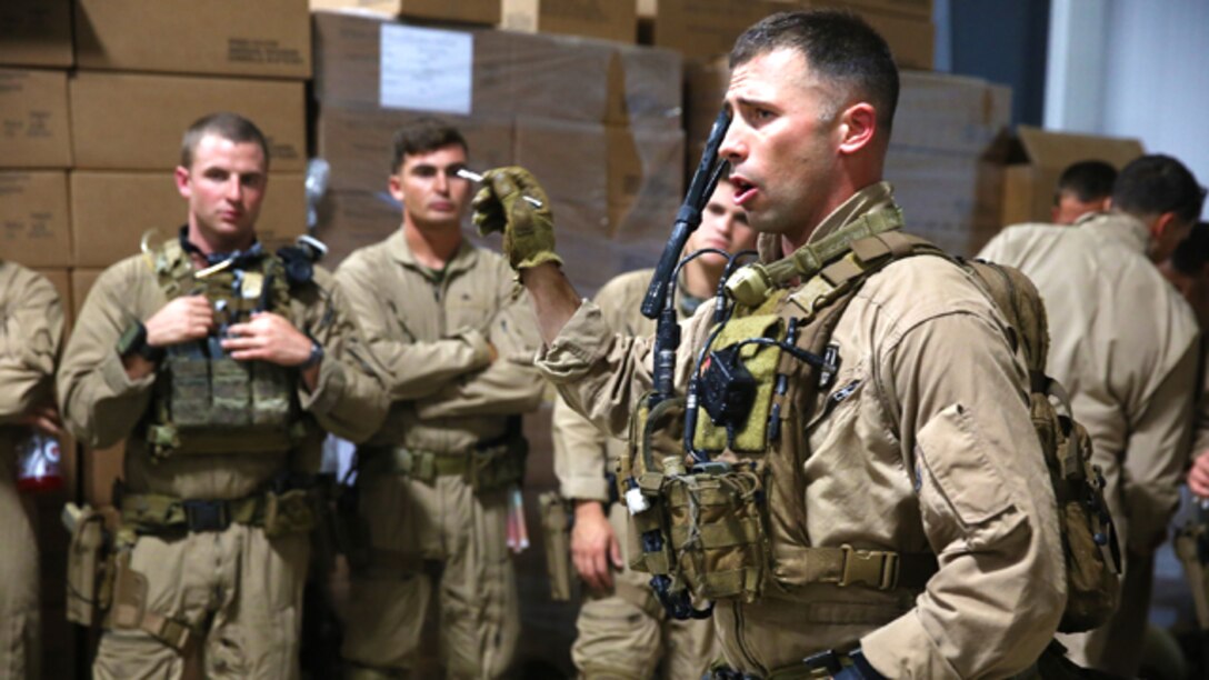 U.S. Marines with the 15th Marine Expeditionary Unit’s Maritime Raid Force conduct a raid during realistic urban training aboard Camp San Luis Obispo, Calif., Dec. 5, 2014. RUT prepares the Marines of the 15th MEU for their upcoming deployment, enhancing their combat skills in environments similar to those they may find in future missions. (U.S. Marine Corps photo by Cpl. Anna Albrecht/Released)