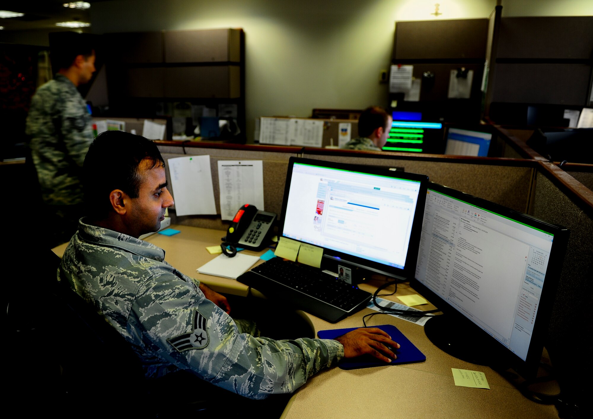 Senior Airman Rajat Nair, a 1st Special Operations Comptroller Squadron account technician, answers financial email inquiries at the wing headquarters building on Hurlburt Field, Fla., Dec. 4, 2014. The 1st SOCPTS is a 1st Special Operations Wing staff agency, managing the financial business of Hurlburt Field. (U.S. Air Force photo/Senior Airman Christopher Callaway) 
