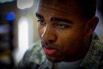 Senior Airman Jonathan Chapman, a 1st Special Operations Comptroller Squadron retirements/separations technician, prepares a retirement account in the wing headquarters building on Hurlburt Field, Fla., Dec. 4, 2014. The 1st SOCPTS is a 1st Special Operations Wing staff agency managing the financial business of Hurlburt Field. (U.S. Air Force photo/Senior Airman Christopher Callaway)