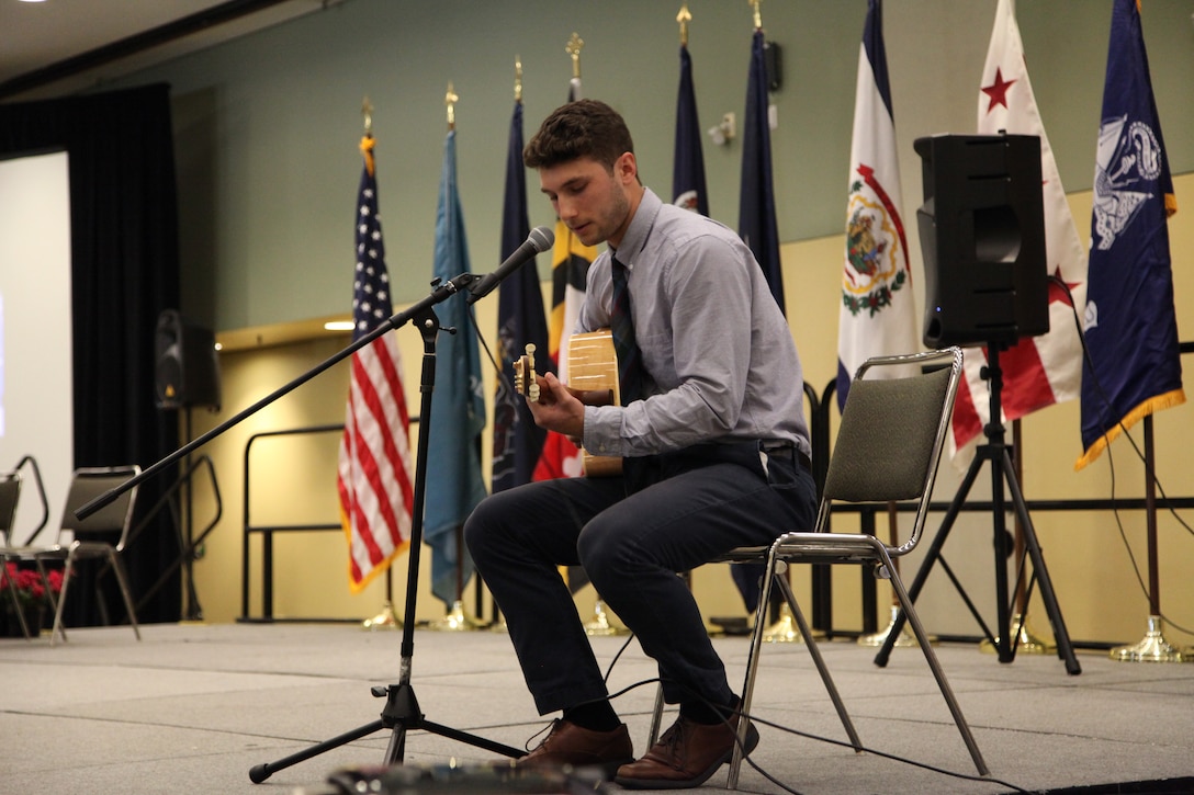 Environmental Engineer, DA Intern, Marco Ciarla provided musical accompaniment during the May 22 Award Ceremony. He performed a rendition of Tom Petty's 1989 hit "Free Fallin" during the ceremony, as well as an original song immediately following the event.  