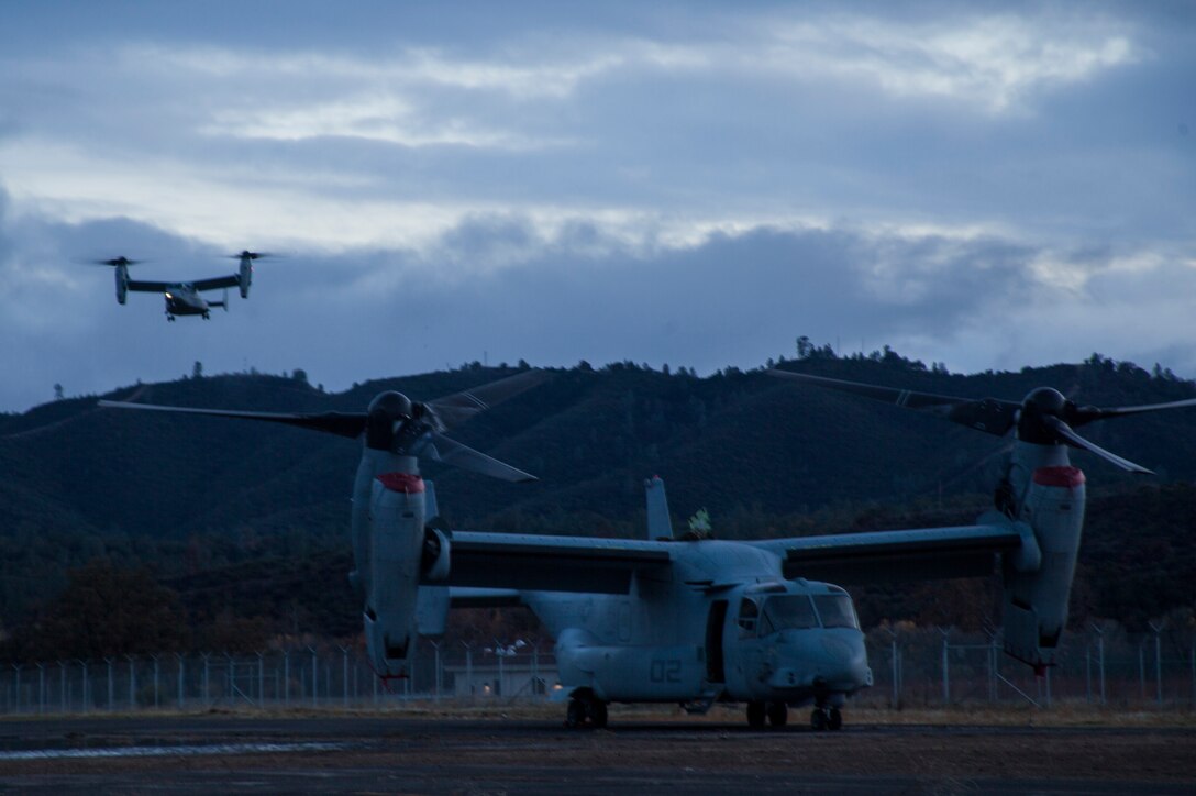 MV-22B Ospreys with Marine Medium Tilt-Rotor Squadron 161 (Reinforced) lands during Realistic Urban Training aboard Fort Hunter Liggett, Calif., Dec. 4, 2014. RUT prepares the 15th MEU Marines for their upcoming deployment, enhancing their combat skills in environments similar to those they may find in future missions. (U.S. Marine Corps photo by Cpl. Elize McKelvey/Released)