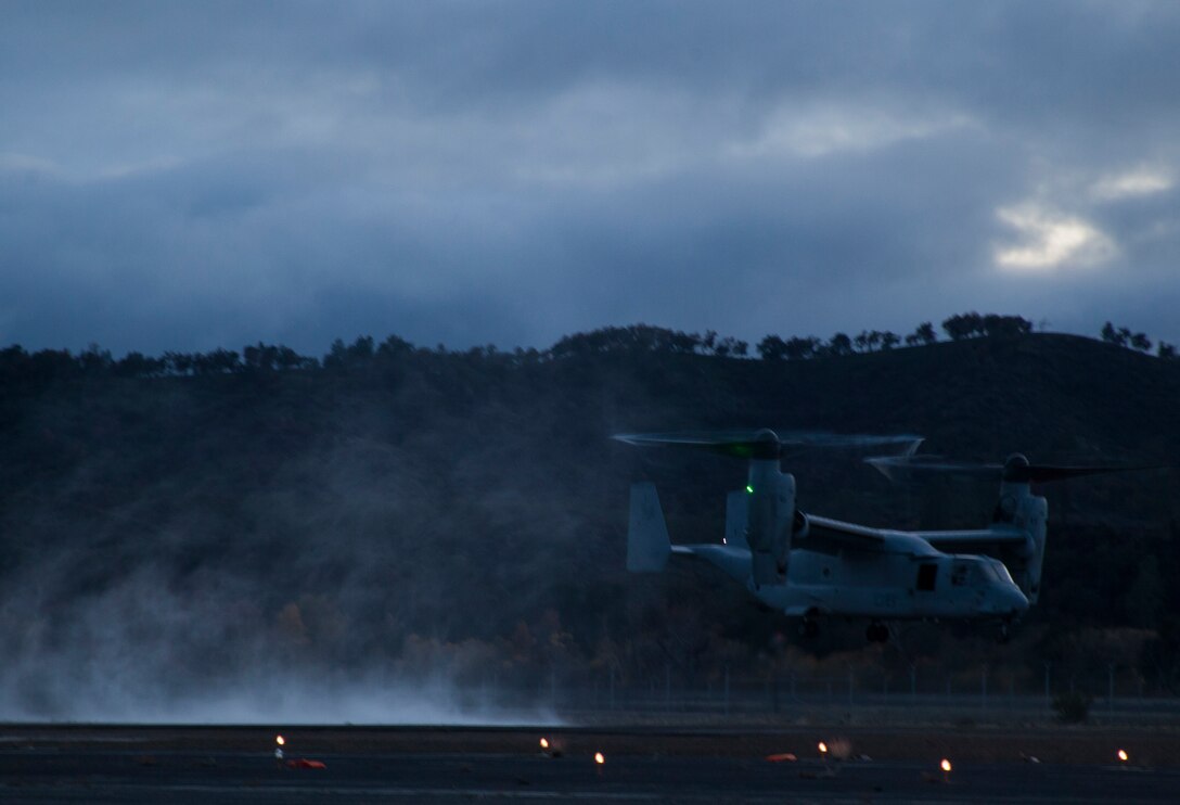An MV-22B Osprey with Marine Medium Tilt-Rotor Squadron 161 (Reinforced) lands during Realistic Urban Training aboard Fort Hunter Liggett, Calif., Dec. 4, 2014. RUT prepares the 15th MEU Marines for their upcoming deployment, enhancing their combat skills in environments similar to those they may find in future missions. (U.S. Marine Corps photo by Cpl. Elize McKelvey/Released)